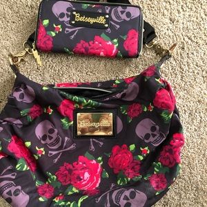 Betseyville skulls & roses hobo with wallet.